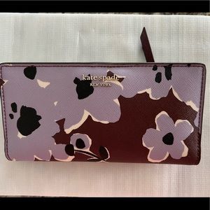 Brand-new with tags Kate spade large slim bifold wallet.